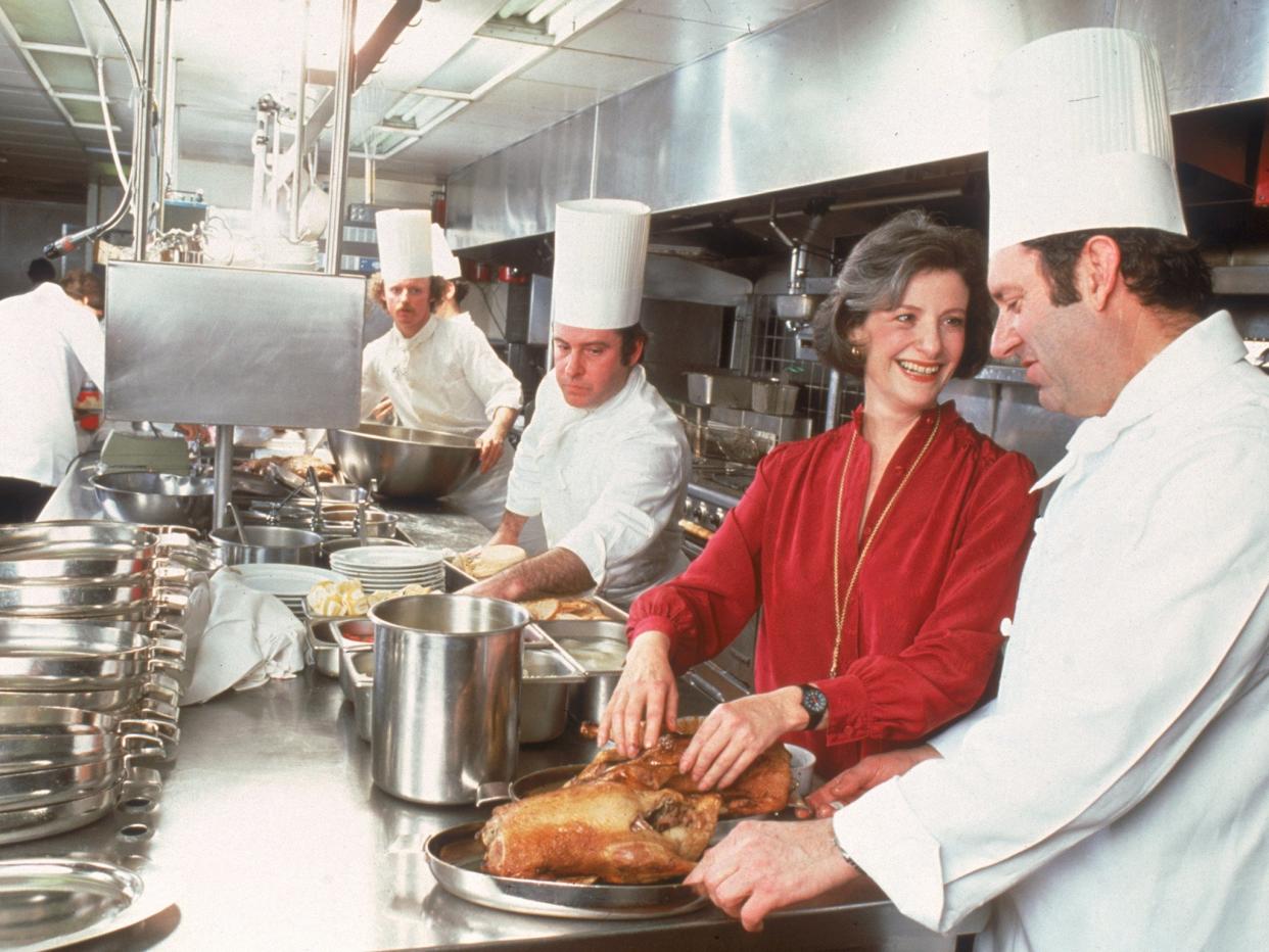 Barbara Kafka consults with chefs at the Windows on the World restaurant in the North Tower of the World Trade Centre: Getty