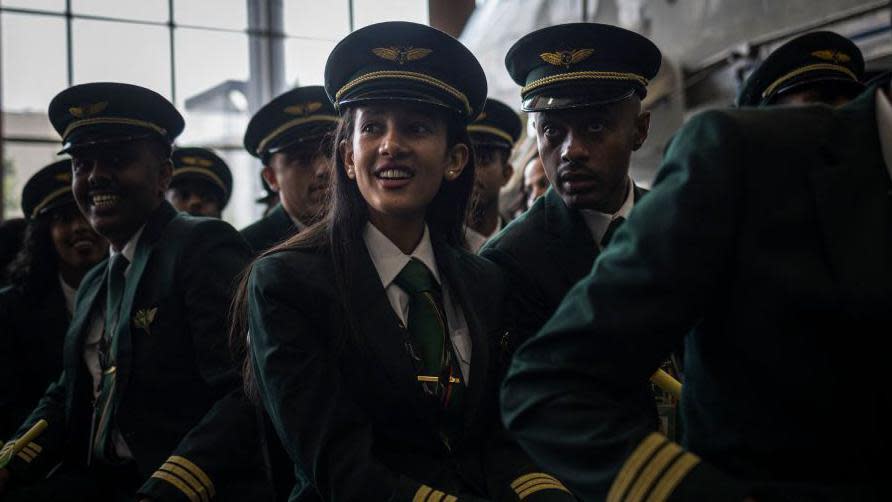 Airline pilot students attend their graduation ceremony at the Ethiopian Aviation University in Addis Ababa on June 15, 2024. First inaugurated in 1964, the Ethiopian Aviation University is a strategic asset of the country national carrier that form Ethiopians and foreign pilots, cabin crew and technicians, making it one of the largest aviation training centre in Africa. 