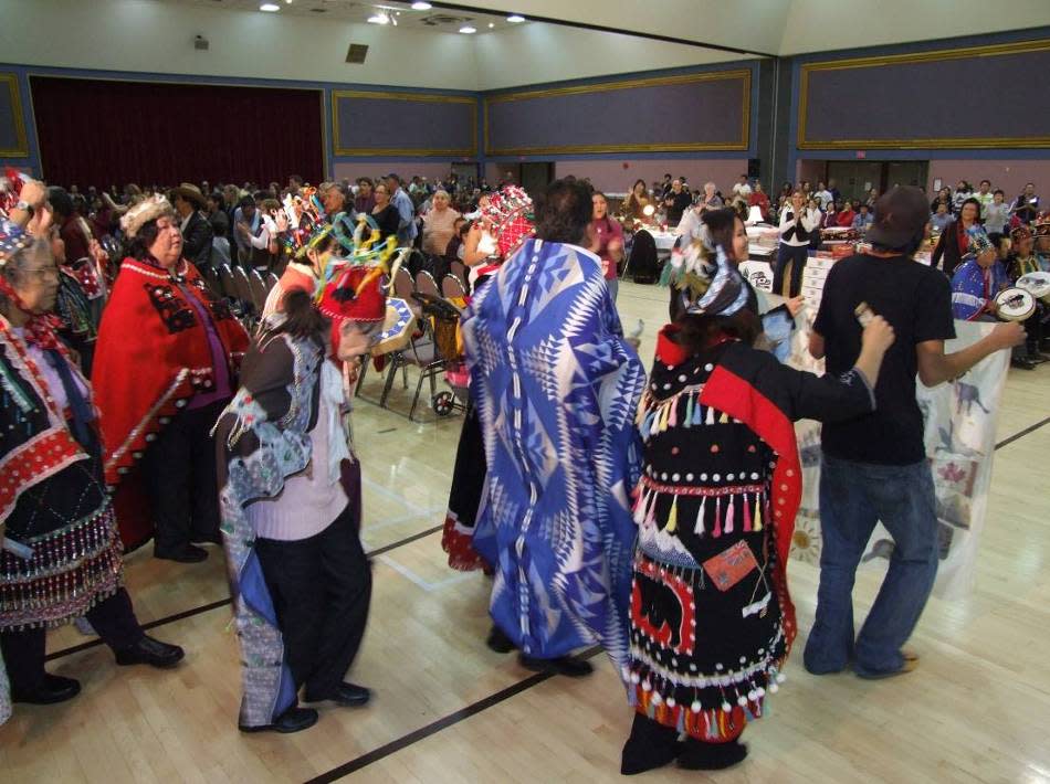 Indigenous dancers in northern B.C. during an  All Clans Feast put on by Carrier Sekanni Family Services in 2015 to demonstrate and teach about potlatch.  