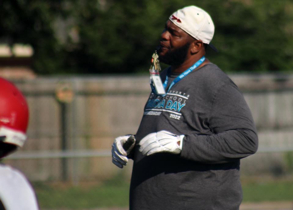 Char-ron Dorsey blows a whistle to begin high school football practice at Parker in 2022. Dorsey, a former NCAA national champion and NFL offensive tackle, died at age 46.