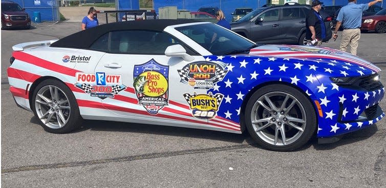 The Bristol Motor Speedway pace car was parked at Tennessee State's Hale Stadium Wednesday where Tigers coach Eddie George received the Neighborhood Heroes award.