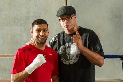 Amir Khan (L) and trainer Virgil Hunter. (Photo by Alexis Cuarezma/Getty Images)