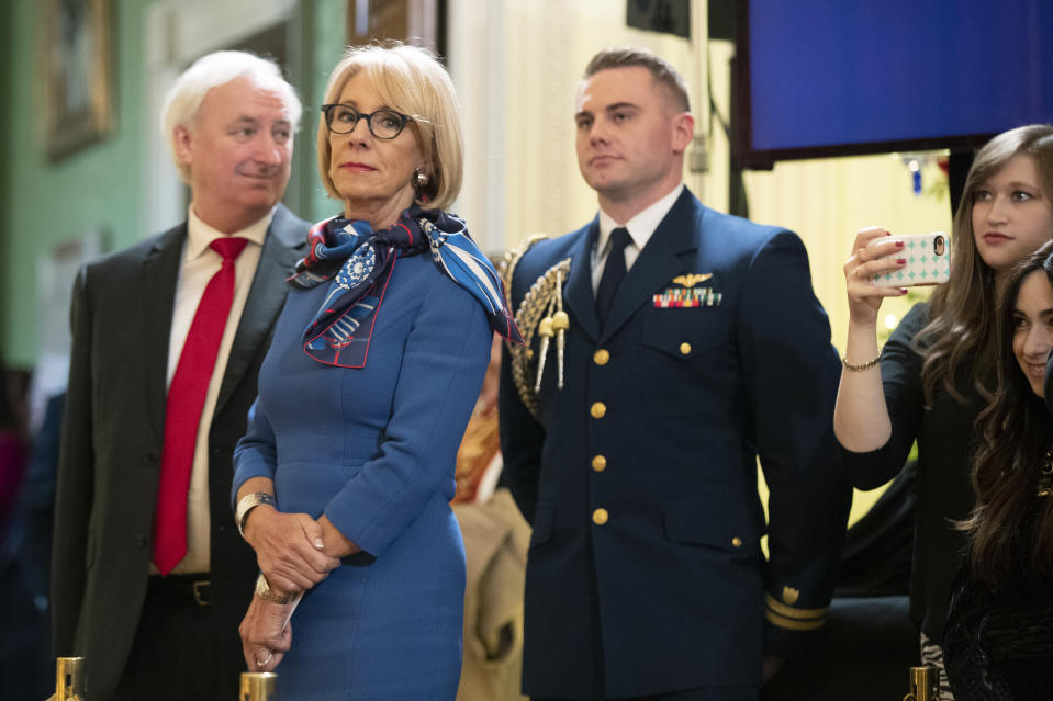 Education Secretary Betsy DeVos attends a Hanukkah reception in the East Room of the White House, Wednesday, Dec. 11, 2019, in Washington. (AP Photo/Manuel Balce Ceneta)