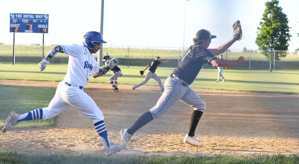 Colo-Nesco's Kaleb Gray (16) reaches first base safely during the third inning of the Royals' 7-3 victory over Grand View Christian Thursday, June 23, 2022, in Zearing, Iowa.