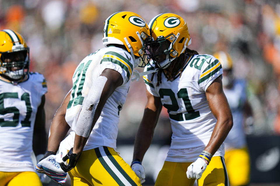 Green Bay Packers safety Adrian Amos (31) celebrates an interception with cornerback Eric Stokes (21) against the Cincinnati Bengals in the second half of an NFL football game in Cincinnati, Sunday, Oct. 10, 2021. (AP Photo/AJ Mast)