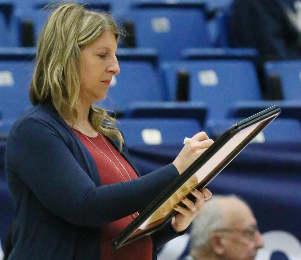 Akron women's basketball head coach Melissa Jackson draws up a play during a home game against Kent State during the 2022-23 season.