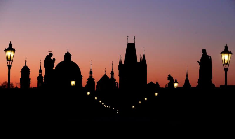 The empty medieval Charles Bridge is seen in Prague