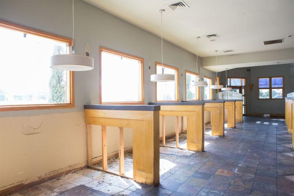 Before: As seen on Fixer Upper, the Elite Cafe had long walkways throughout the restaurant with booth and table seating on each side.