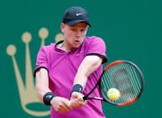 Tennis - Monte Carlo Masters - Monaco, 19/04/2017. Kyle Edmund of Britain plays a shot to Rafael Nadal of Spain. REUTERS/Eric Gaillard