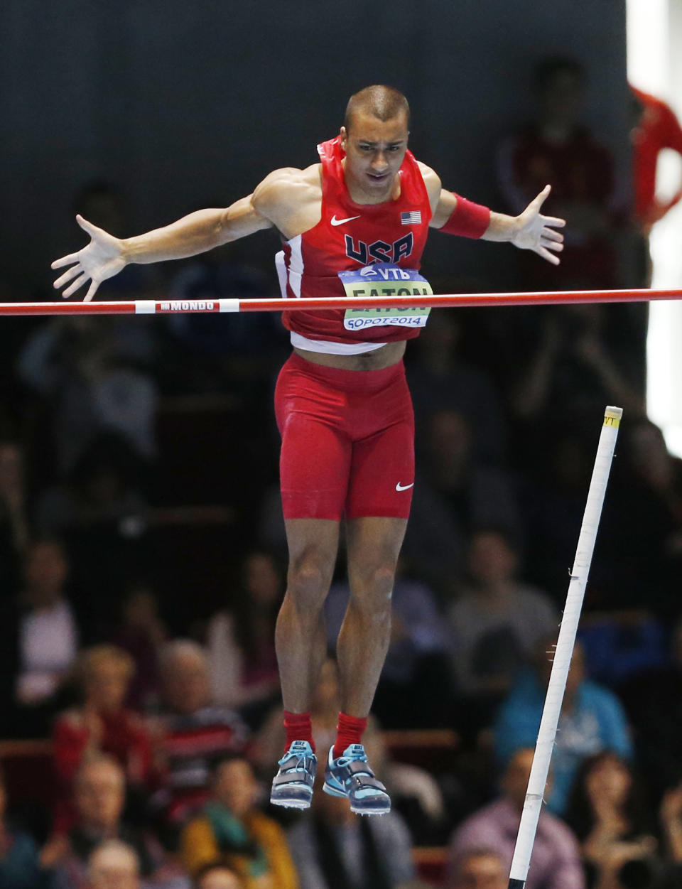 United States' Ashton Eaton clears the bar in the pole-vault of the heptathlon during the Athletics World Indoor Championships in Sopot, Poland, Saturday, March 8, 2014. (AP Photo/Petr David Josek)