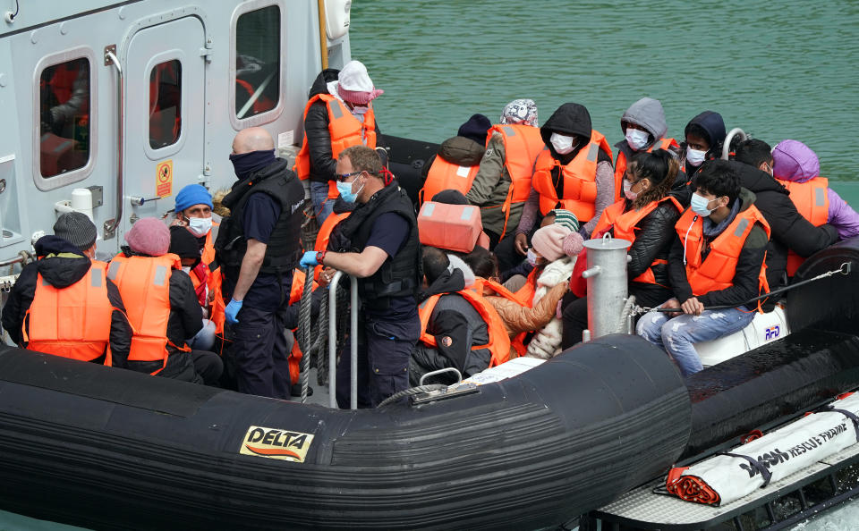 File photo dated 6/5/2022 of a group of people thought to be migrants are brought in to Dover, Kent, by Border Force officers following a small boat incident in the Channel. More than 8,000 migrants have arrived in the UK after crossing the English Channel this year, figures show. Since the start of 2022, 8,393 people have reached the UK after navigating busy shipping lanes from France in small boats, according to analysis of government data by the PA news agency. Issue date: Monday May 16, 2022.