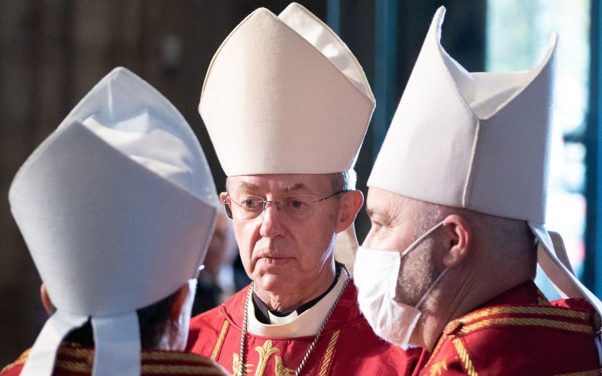 The Archbishop of Canterbury, the Most Reverend Justin Welby, has called for Britain to be 'generous' to migrants - but there are concerns some have converted to Christianity to avoid deportation - Stefan Rousseau