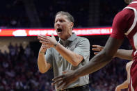 Arkansas head coach Eric Musselman shouts at an official during the second half of an NCAA college basketball game against Oklahoma, Saturday, Dec. 11, 2021, in Tulsa, Okla. (AP Photo/Sue Ogrocki)