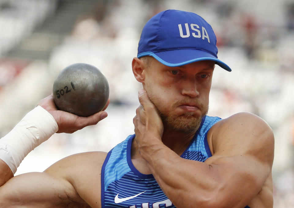 FILE - United States' Trey Hardee prepares an attempt in the shot put of the decathlon during the World Athletics Championships in London Friday, Aug. 11, 2017. (AP Photo/Matt Dunham, File)