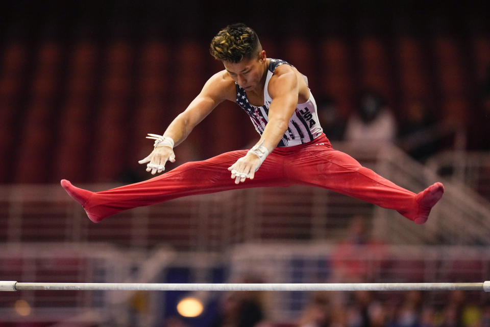 Yul Moldauer competes on the horizontal bar during the men's U.S. Olympic Gymnastics Trials Thursday, June 24, 2021, in St. Louis. (AP Photo/Jeff Roberson)