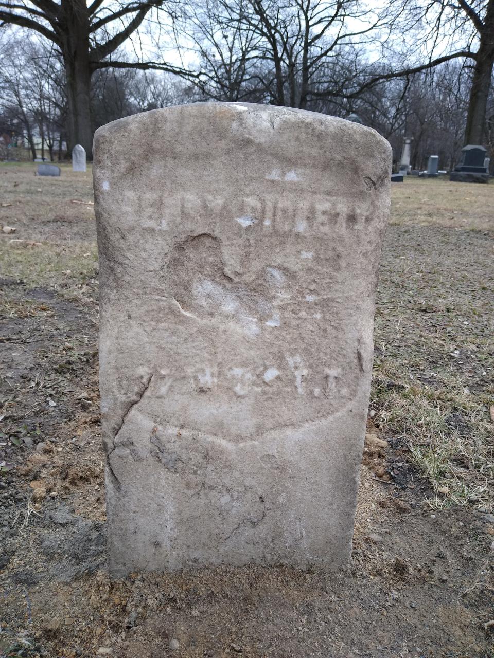 The weather-beaten headstone of Civil War veteran Henry Pickett has been unearthed at Glendale Cemetery in Akron. He died in 1897 at age 71.