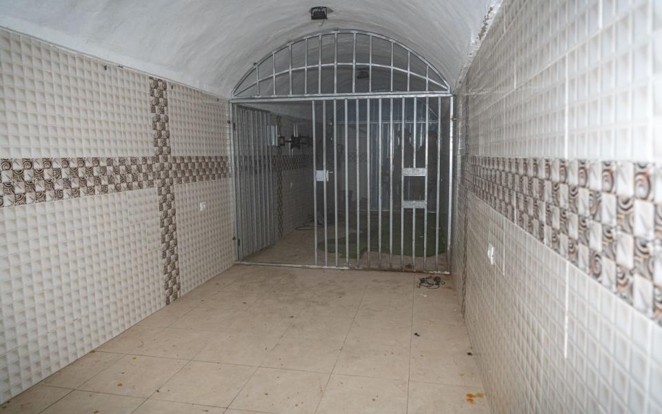 Metal gates can be seen inside the Hamas tunnel