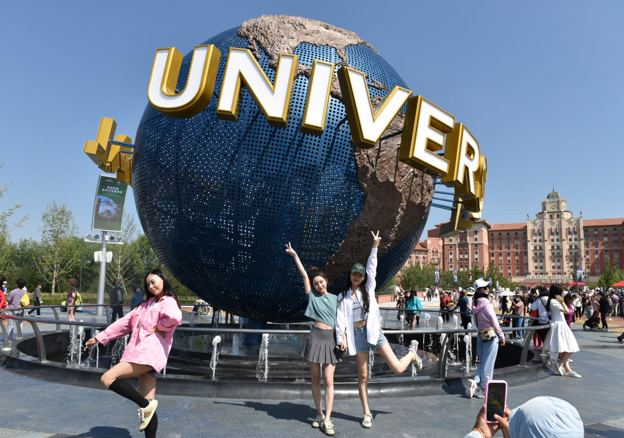 BEIJING
                        , CHINA - SEPTEMBER 07 2021: Tourists stop by the iconic sculpture of the Universal Studios theme park in Beijing, China Tuesday, Sept. 07, 2021. (Photo credit should read Feature China/Barcroft Media via Getty Images)