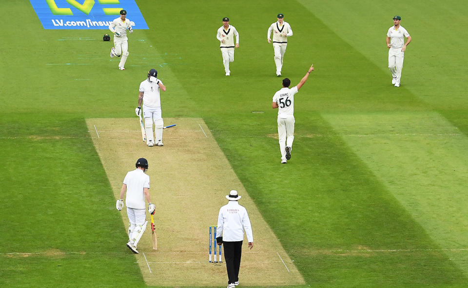 Mitchel Starc celebrates the wicket of Ben Stokes.