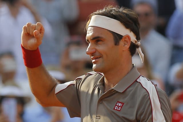 Roger Federer celebrates his victory in the quarter-finals 