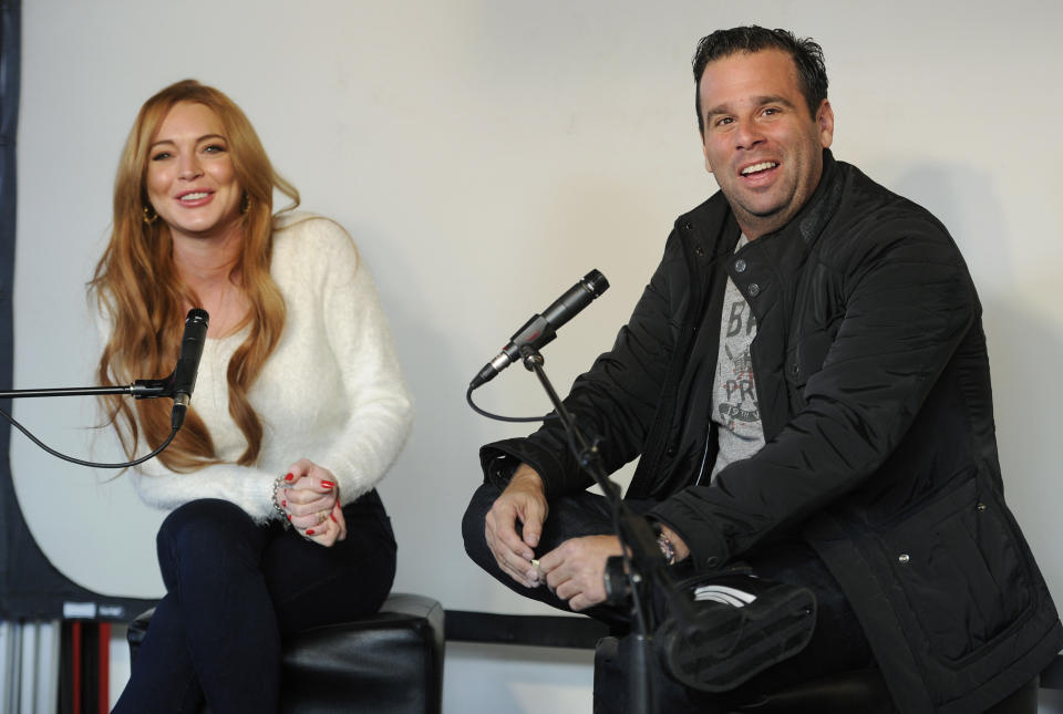 Actress Lindsay Lohan and producer Randall Emmett take part in a news conference at the 2014 Sundance Film Festival, Monday, Jan. 20, 2014, in Park City, Utah. Emmett and Lohan announced the forthcoming production of a new film, "Inconceivable," in which Lohan will star and co-produce. (Photo by Chris Pizzello/Invision/AP)