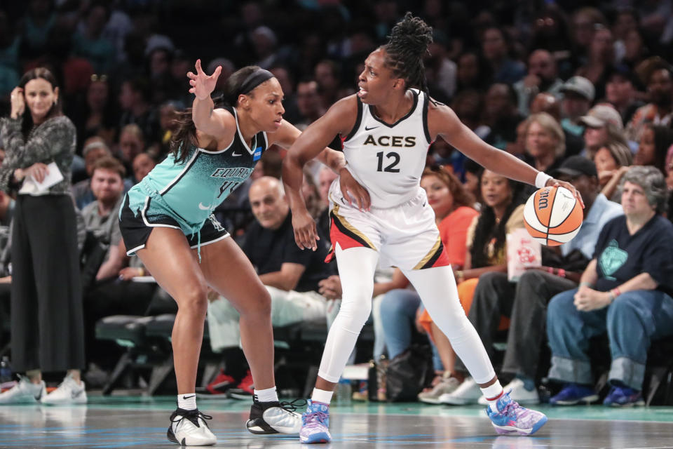 Las Vegas Aces guard Chelsea Gray looks to post up against New York Liberty forward Betnijah Laney in the first quarter at Barclays Center in New York on Aug. 6, 2023. (Wendell Cruz/USA TODAY Sports)