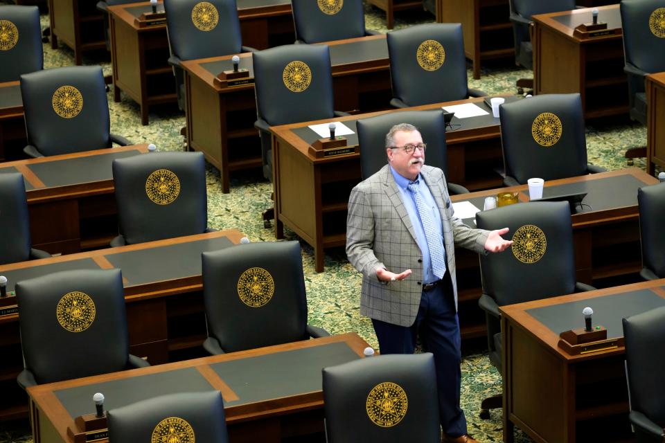 Rep. Mark McBride asks House Speaker Pro Tem Kyle Hilbert what's going on Wednesday as House Republicans waited until the end of roll call to come to the floor, on the second day of the legislative special session at the Oklahoma Capitol.