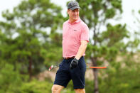 <p>Peyton Manning likes what he sees on Sunday while playing (and eventually, winning with Tiger Woods) during the Champions for Charity golf tournament in Hobe Sound, Florida. The event — rounded out by Tom Brady and Phil Mickelson — raised $20 million for coronavirus relief efforts. </p>