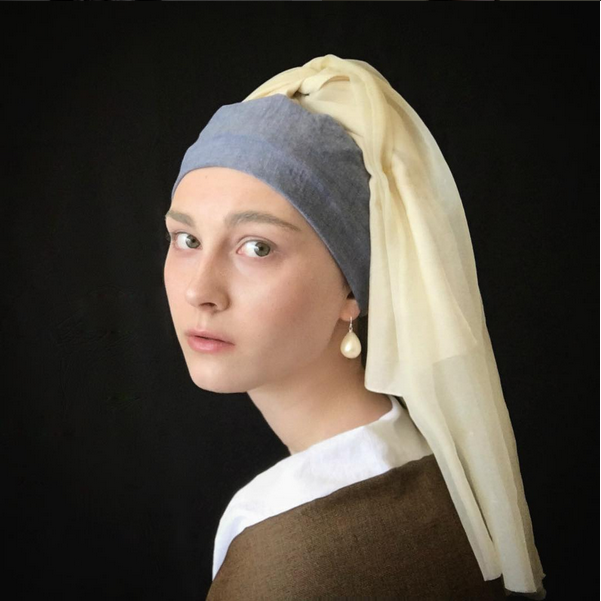 Re-creating famous the Dutch painting Girl With a Pearl Earring.