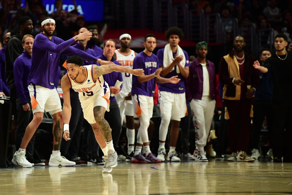 Apr 6, 2022; Los Angeles, California, USA; Phoenix Suns guard Cameron Payne (15) reacts after making a three-point basket against the Los Angeles Clippers during the second half at Crypto.com Arena.