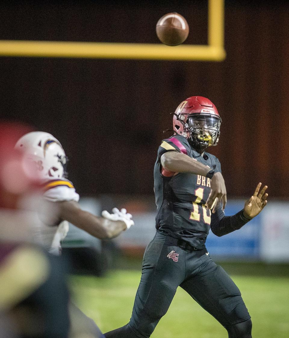 Lake Gibson quarterback (10) Joel Morris throws a pass as he is pressured by a Lehigh defender during first half action at Lake Gibson High School in Lakeland Fl. Friday September 8 ,2023.Ernst Peters/The Ledger