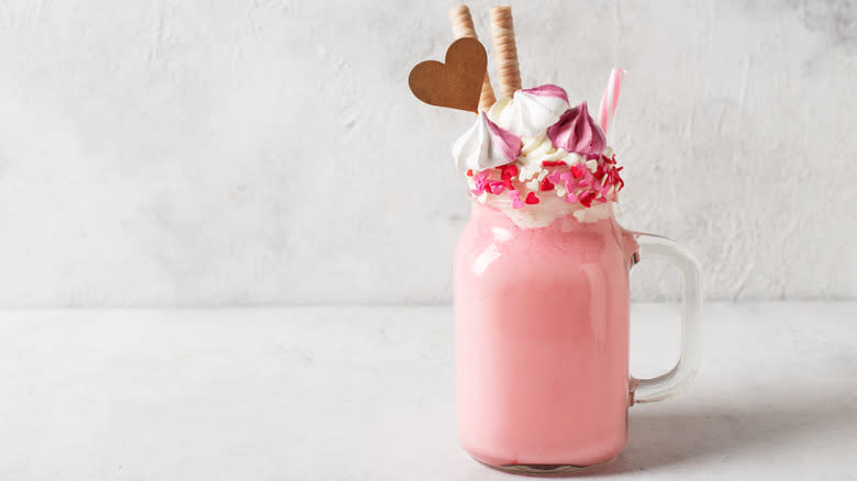 pink milkshake with marshmallow cream