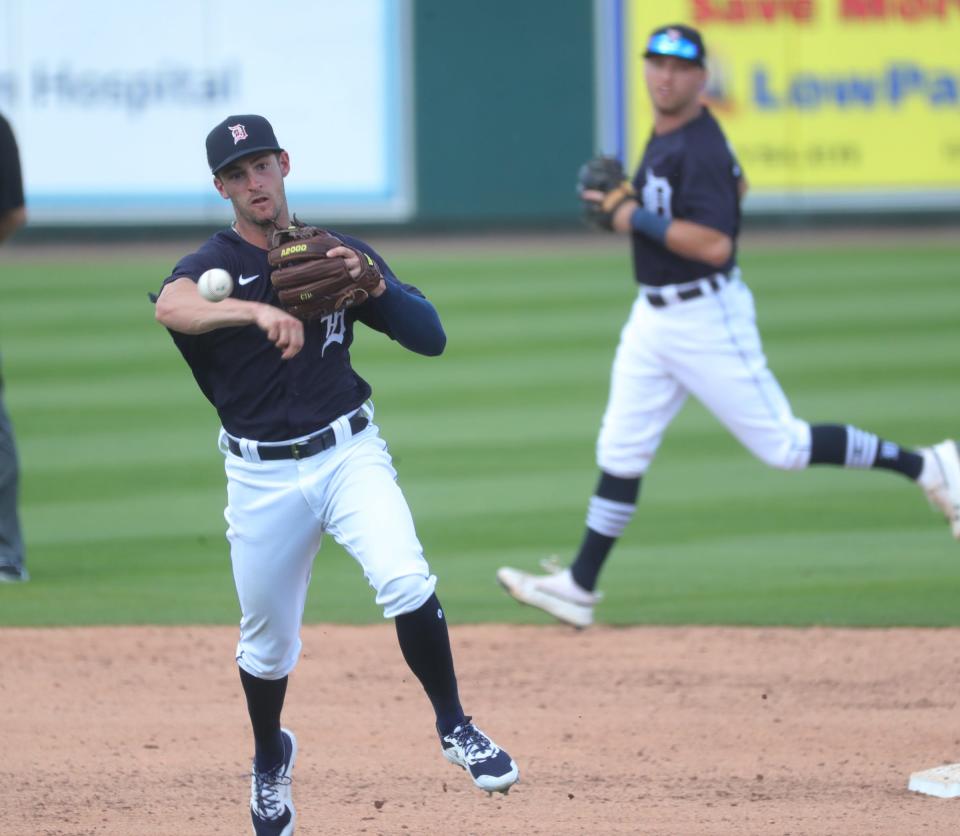 Detroit Tigers' Zack Short throws to first during Grapefruit League action against the Philadelphia Phillies on Sunday, Feb. 28, 2021, at Publix Field at Joker Marchant Stadium in Lakeland, Florida.