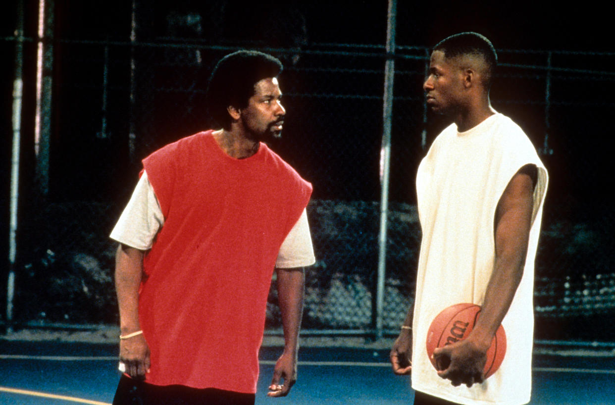 Denzel Washington and another man in a scene from the film 'He Got Game', 1998. (Photo by 20th Century-Fox/Getty Images)