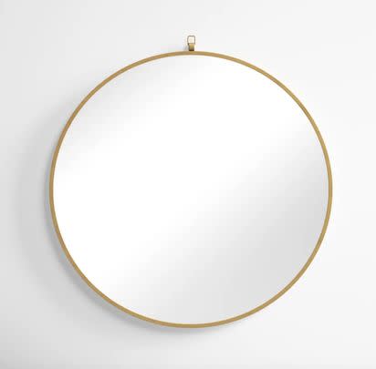 A round wall mirror (51% off list price)