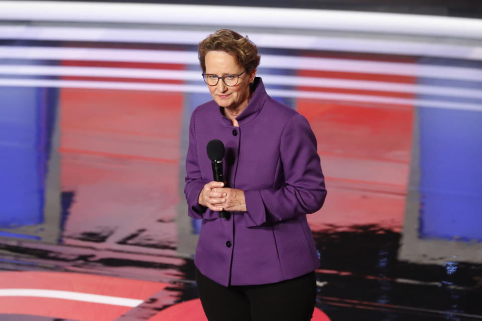 FILE - Mary Kay Henry, International President of the Service Employees International Union (SEIU) speaks before the second of two Democratic presidential primary debates hosted by CNN, on July 31, 2019, in the Fox Theatre in Detroit. Just over a year ago, millions of energized young people, women, voters of color and independents joined forces to send Joe Biden to the White House. But 12 months after he entered the Oval Office, many describe a coalition in crisis.(AP Photo/Paul Sancya, File)