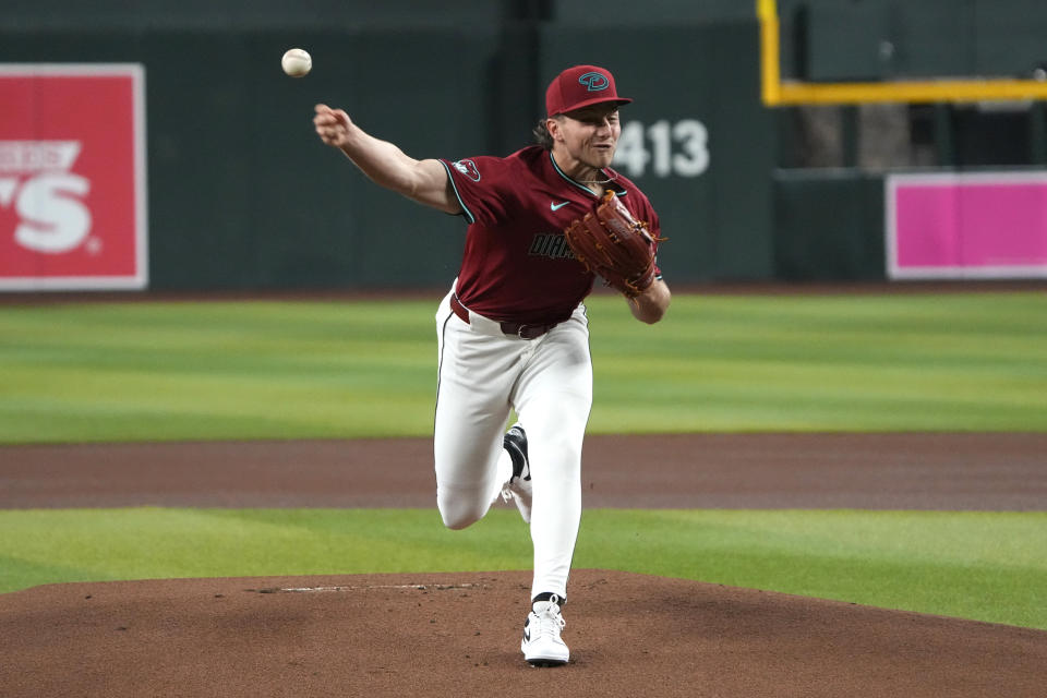 Arizona Diamondbacks pitcher Brandon Pfaadt throws to a Colorado Rockies batter during the first inning of a baseball game Sunday, March 31, 2024, in Phoenix. (AP Photo/Rick Scuteri)