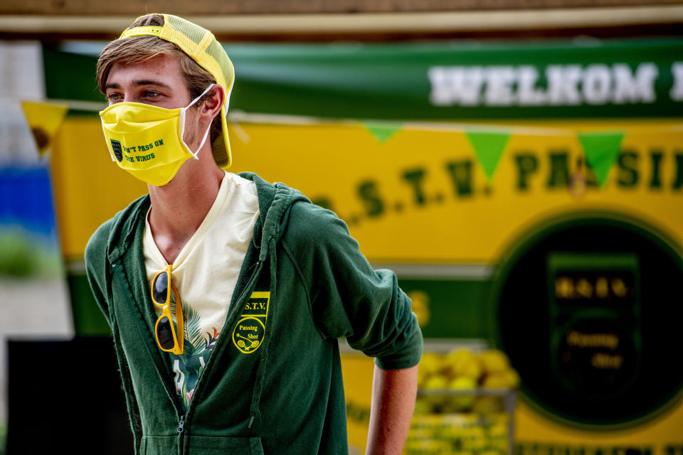 ROTTERDAM, NETHERLANDS - 2020/08/17: A student seen wearing a facemask in the information market during Eurekaweek. Eurekaweek also known as the introduction week for the new academic year for Erasmus University Rotterdam where students get to know their university. The Eurekaweek will take place in a different form this year due to the coronavirus pandemic, it will be divided into three physical days and one online day however all activities will be in line with measures set by government for Covid-19. (Photo by Robin Utrecht/SOPA Images/LightRocket via Getty Images)