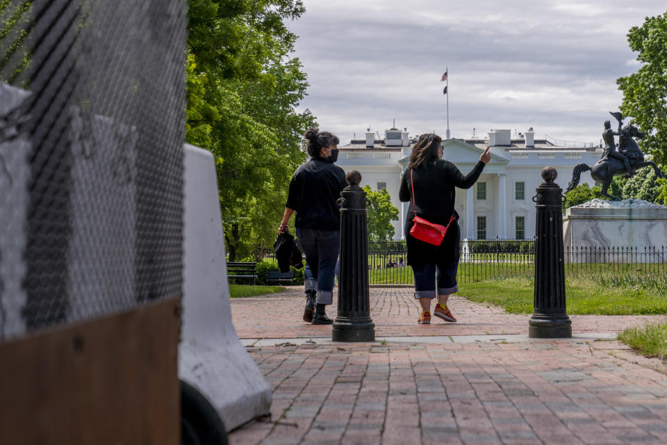 Lafayette Park, across the street from the White House, reopens in a limited capacity in Washington, Monday, May 10, 2021. Fencing remains in place around the park which will allow the Secret Service to temporarily close the park as they deem necessary. (AP Photo/Andrew Harnik)