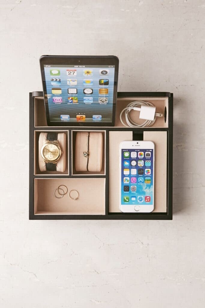 Perfect for their nightstand, this charging station features different compartments and removable lids to store even more cables and trinkets. It has an opening in the back to put a charging cable through. <a href="https://fave.co/2USorCj" target="_blank" rel="noopener noreferrer">Find it for $54 at Urban Outfitters</a>.