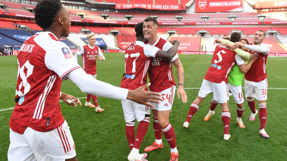 Arsenal players, pictured here celebrating after winning the FA Cup.