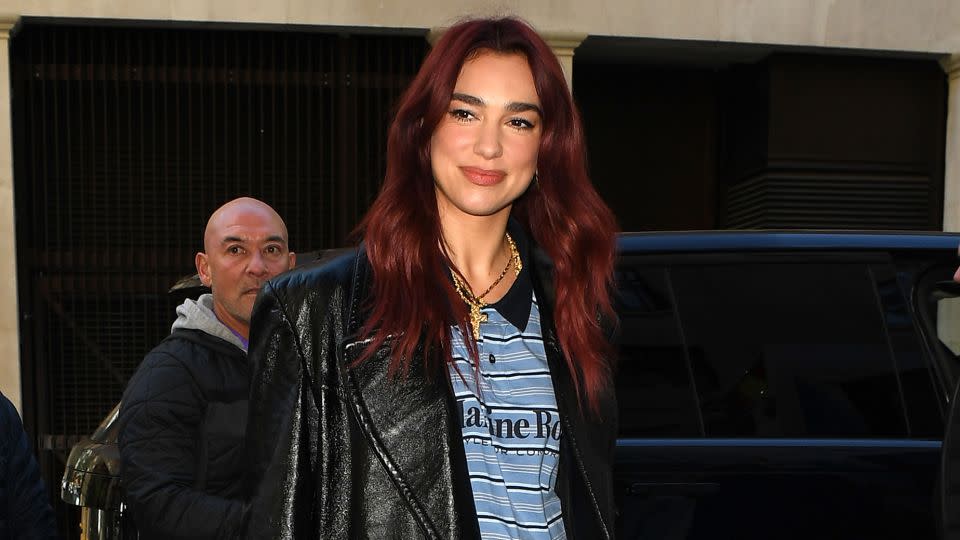 Dua Lipa's new maroon locks are expertly timed with the drop of a new track. - MEGA/GC Images/GettyImages