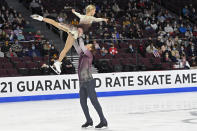 Evgenia Tarasova and Vladimir Morozov, of Russia, perform during the pairs short program at the Skate America figure skating event Friday, Oct. 22, 2021, in Las Vegas. (AP Photo/David Becker)