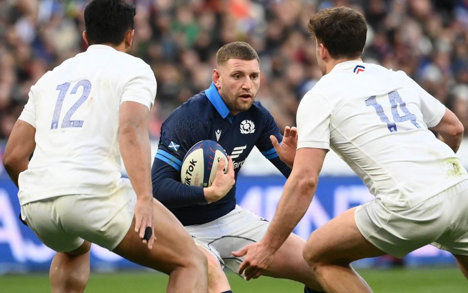 Finn Russell playing for Scotland - AFP/Franck Fife 