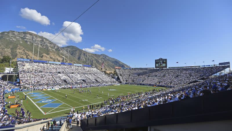 Fans watch the BYU-Washington college football game in LaVell Edwards Stadium on Sept. 21, 2019, in Provo, Utah. 