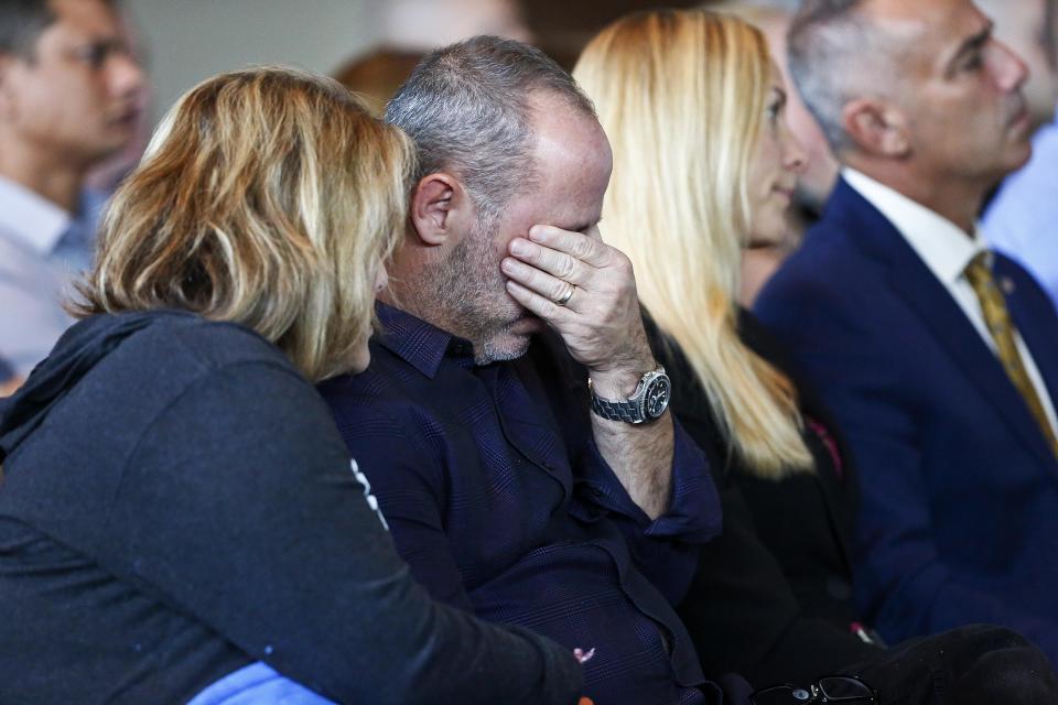 Fred Guttenberg, whose daughter, Jamie, was killed in the Parkland school shooting, right, cries while his wife Jennifer comforts him during a state commission hearing on Nov. 15, 2018. (Photo: ASSOCIATED PRESS)