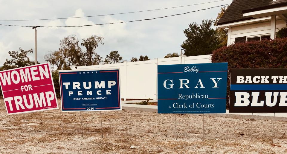 There lots of campaign signs in pro-Trump MacClennyAndrew Buncombe