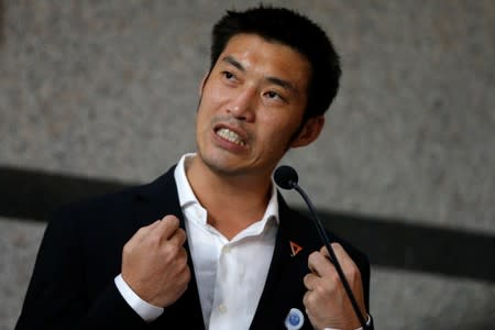 Thanathorn Juangroongruangkit, leader of the Future Forward Party, speaks during a news conference at the parliament in Bangkok