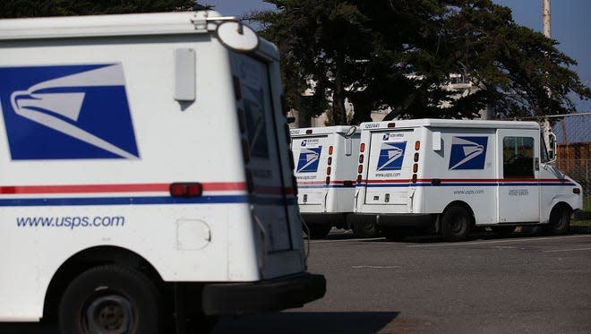 U.S. Postal Service trucks