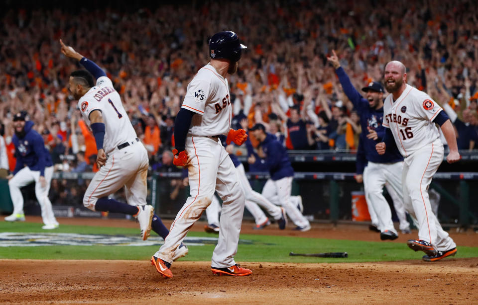 The Astros celebrate their crazy win in Game 5 of the World Series, 13-12. (Getty Images)